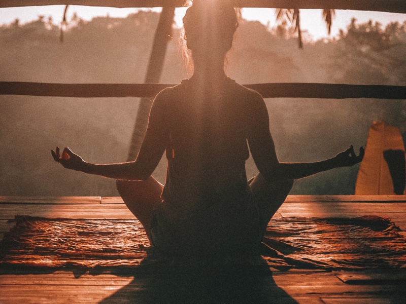 Meditating in lotus position