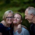 Loving family with down syndrome boy