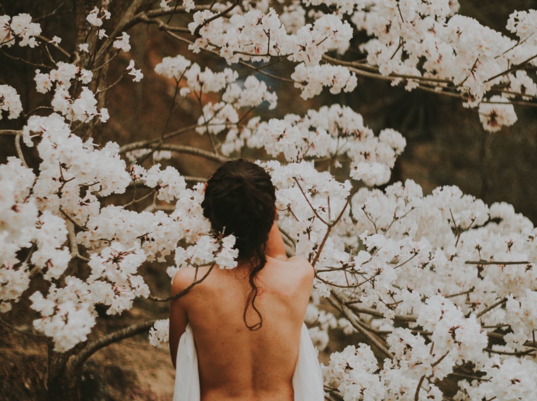 Woman's back in blossoms